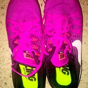 Pink Nike cross country track shoes